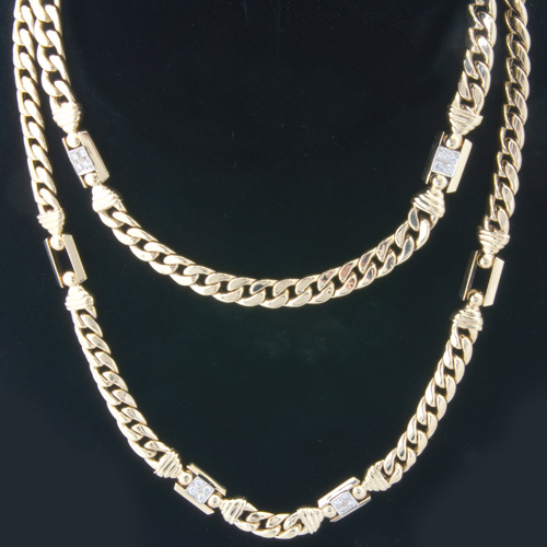 Appraisal: k yg and diamond necklace with curb link chain interspersed