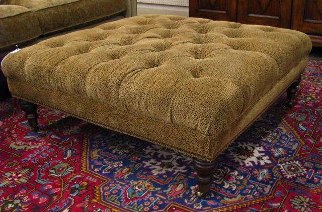 Appraisal: Decorator leopard print cocktail ottoman with button tufted upholstery having