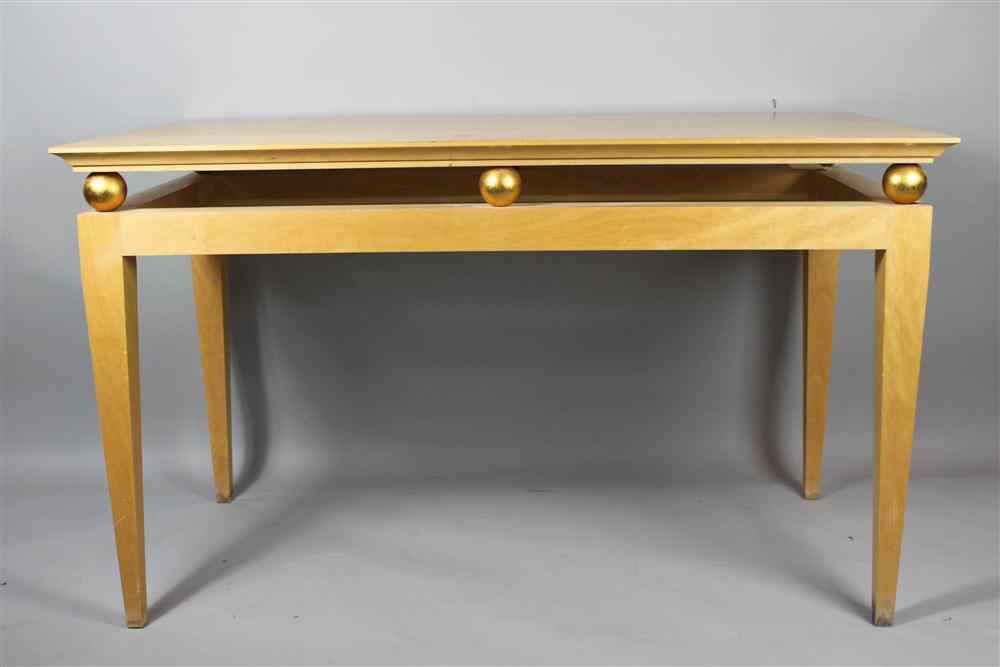 Appraisal: MAPLE WRITING TABLE the rectangular glass top on a molded