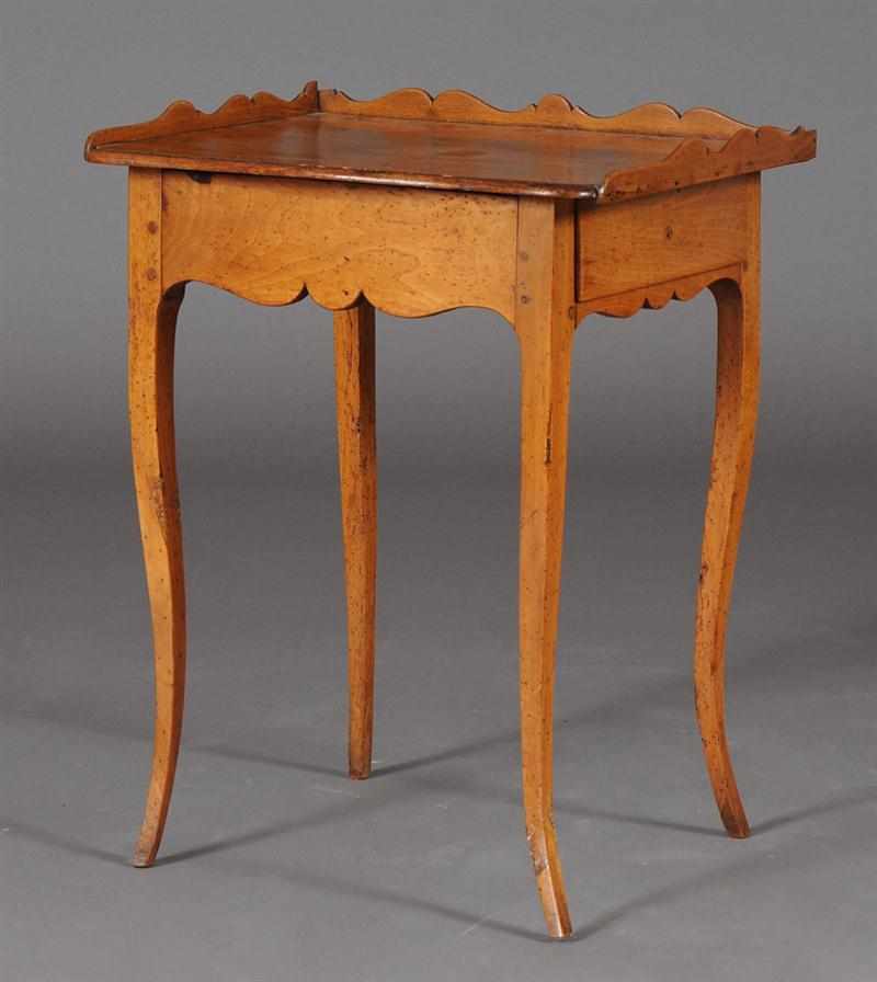 Appraisal: LOUIS XV PROVINCIAL INLAID WALNUT TABLE CRIRE The scalloped three-quarter