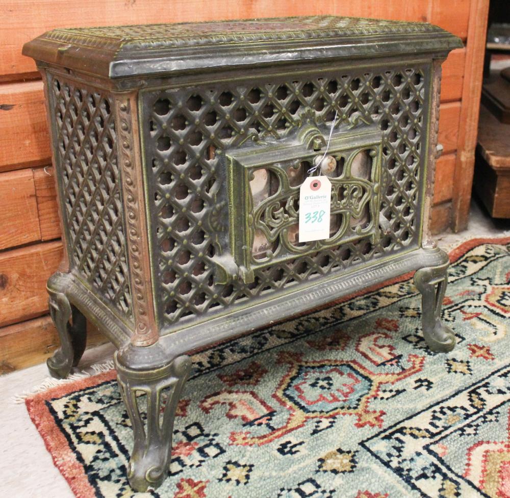 Appraisal: FRENCH GREEN ENAMELED CAST IRON HEATING STOVE Chauffette model by