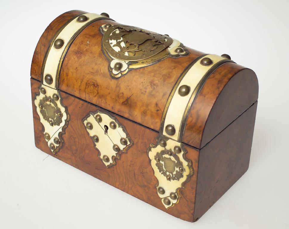 Appraisal: VICTORIAN BURR WALNUT IVORY AND BRASS-MOUNTED CASKET dome-topped the ivory