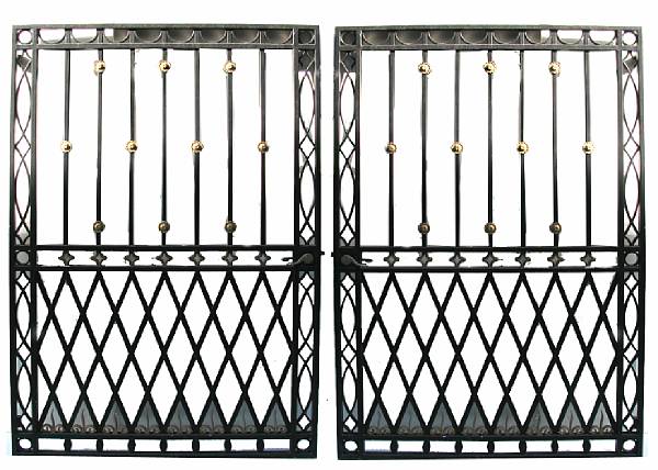 Appraisal: A pair of wrought iron gates together with a small