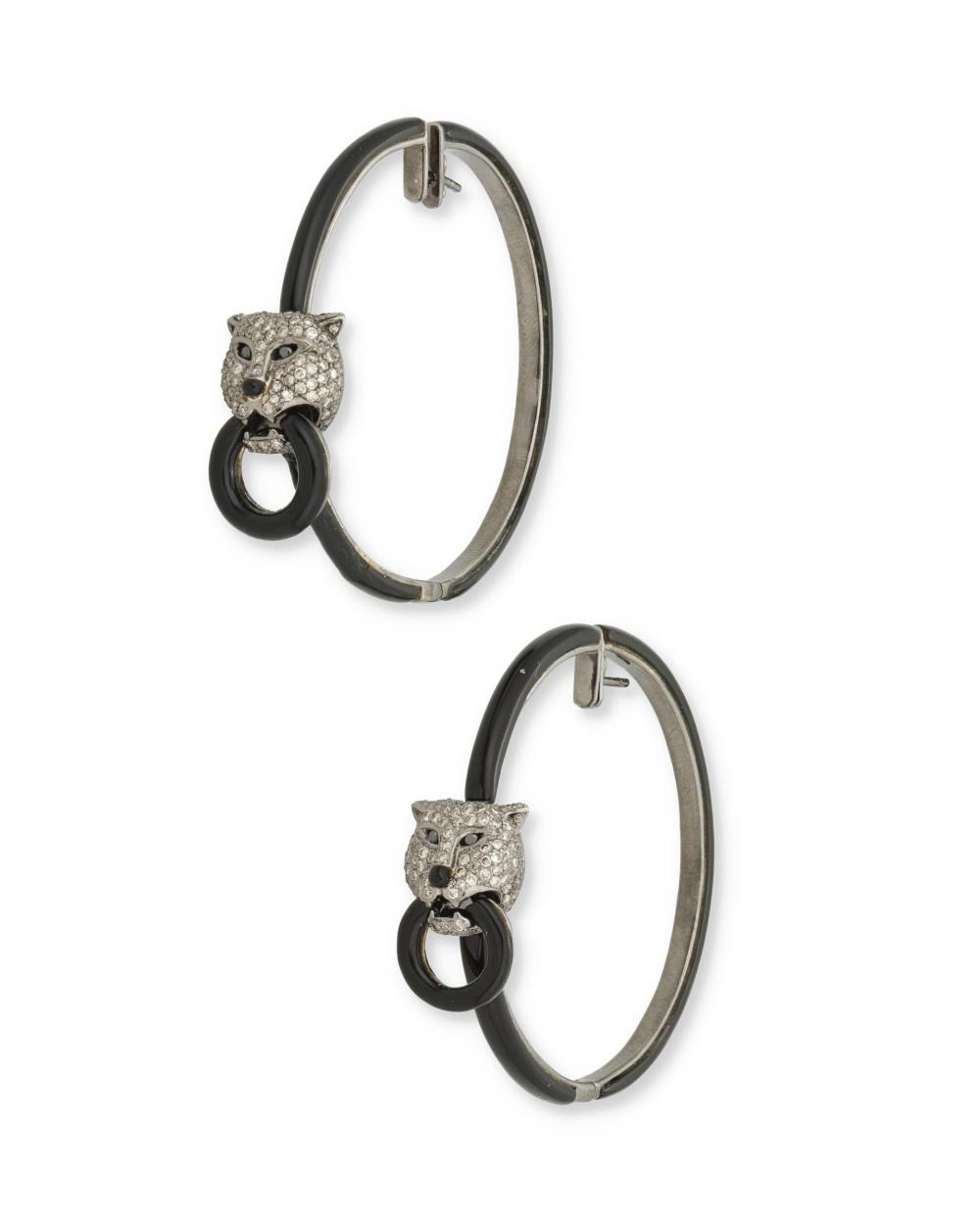 Appraisal: A PAIR OF DIAMOND AND ENAMEL PANTHER HOOP EARRINGSA pair