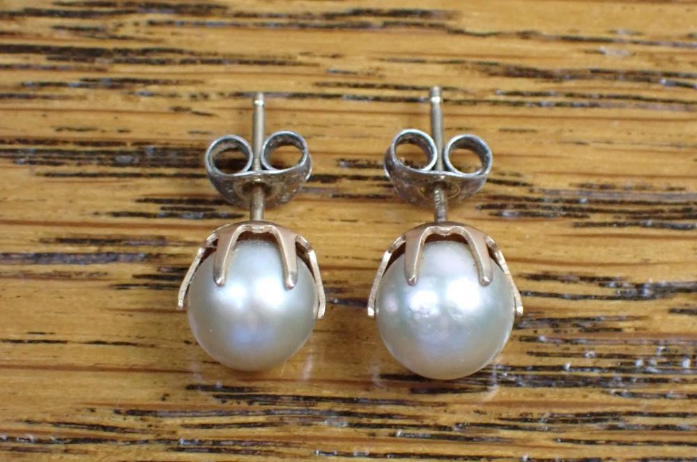 Appraisal: PAIR OF PEARL AND FOURTEEN KARAT GOLD EAR STUDS each