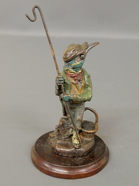 Appraisal: - Cold painted bronze watch holder of a bird dressed