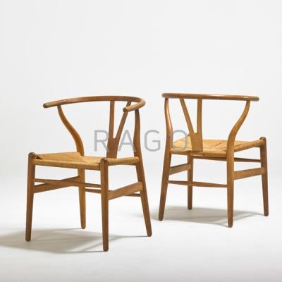 Appraisal: HANS WEGNER CARL HANSEN Pair of wishbone chairs Denmark s