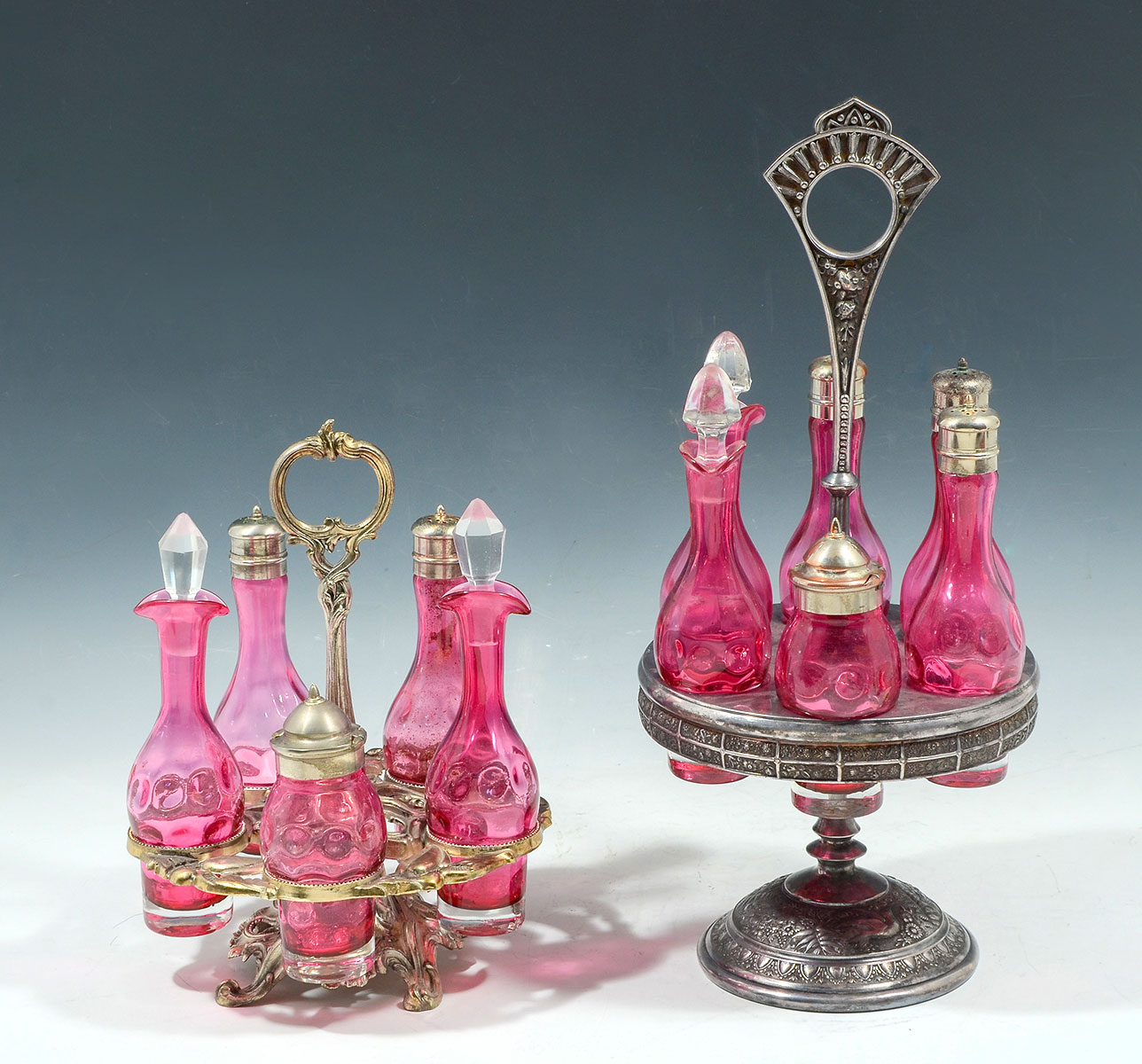 Appraisal: CRANBERRY GLASS CRUET SETS Comprising - pc Cranberry glass cruet