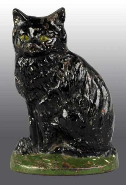 Appraisal: Cast Iron Sitting Cat Doorstop Description Creations Company Condition Very