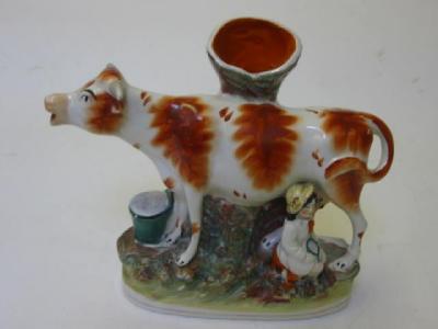 Appraisal: A STAFFORDSHIRE PORCELAIN SPILL VASE th century modelled as a