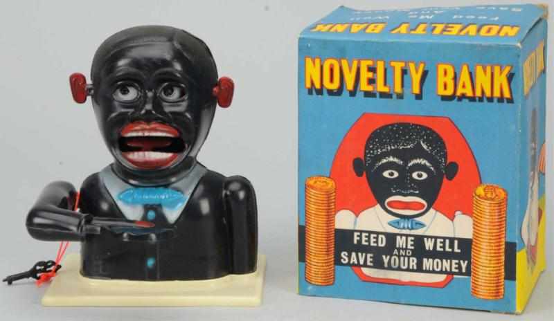 Appraisal: Plastic Novelty Jolly Mechanical Bank Working Includes original box Condition