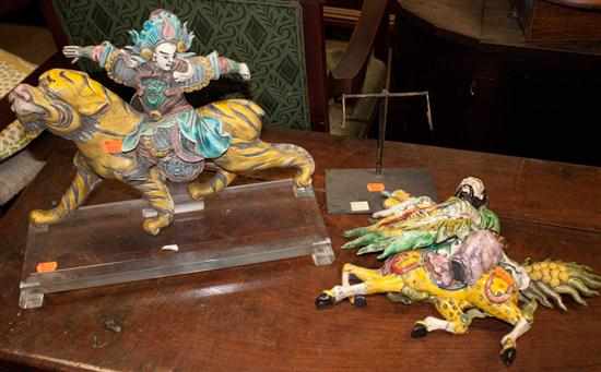 Appraisal: Two Chinese glazed terracotta figural roof tiles as is Estimate