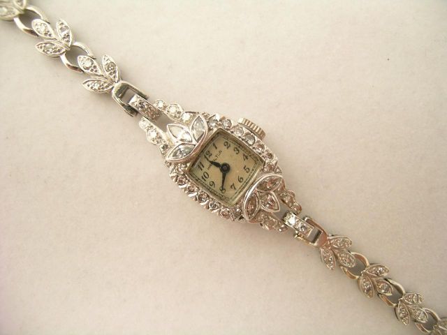 Appraisal: Lady's Platinum Manual Wind Hamilton Watch with an attached kt