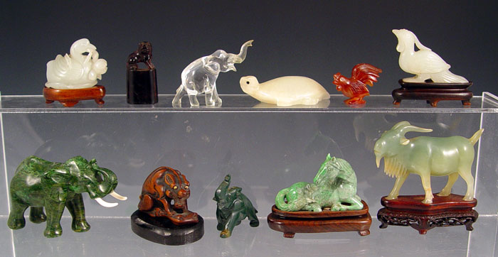 Appraisal: PIECE COLLECTION OF CHINESE CARVED STONE ANIMALS Serpentine verdite amethyst