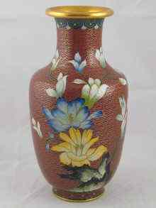 Appraisal: A cloisonn enamelled brass vase with floral designs on a