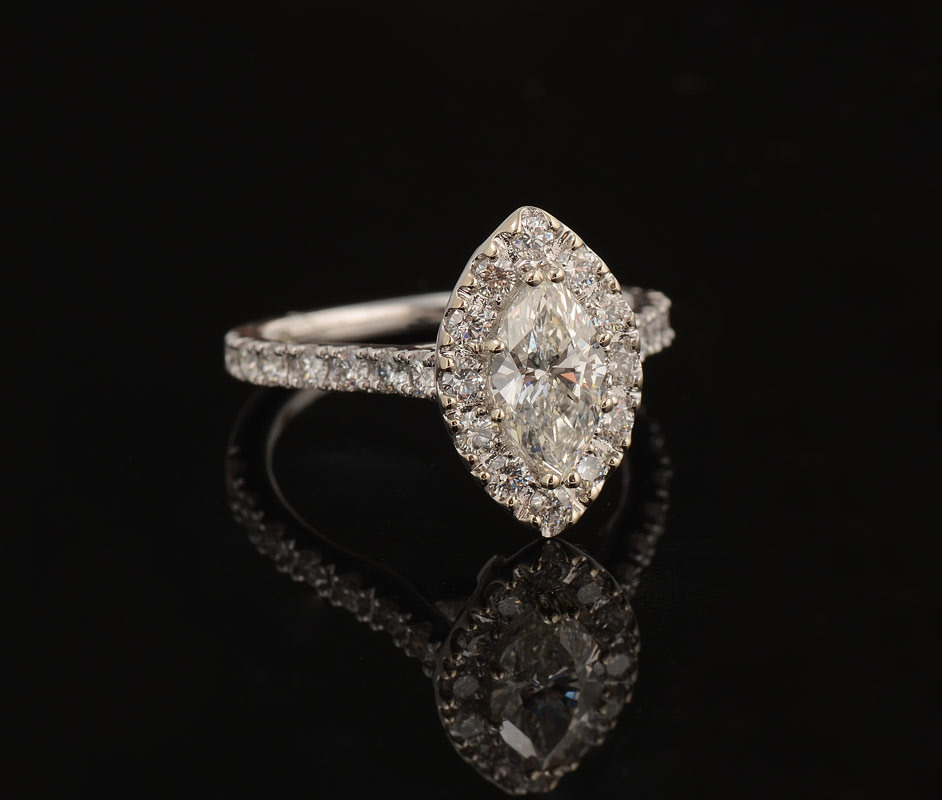 Appraisal: MARQUISE DIAMOND RING K white gold ring centers an approx