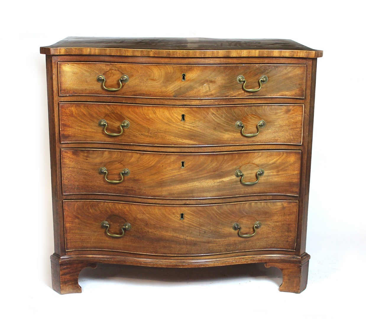 Appraisal: A George III mahogany chest of four long graduated serpentine