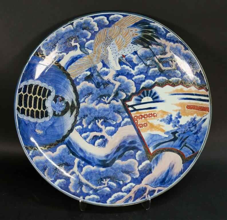 Appraisal: Japanese porcelain charger with Minogame and crane motif Signed on