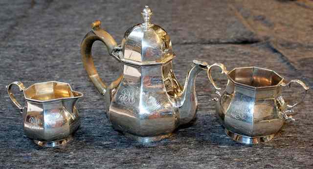 Appraisal: A THREE PIECE SILVER BACHELORS TEA SET baluster octagonal shaped