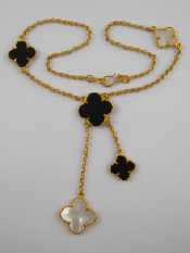 Appraisal: A yellow metal tests carat gold onyx and mother of