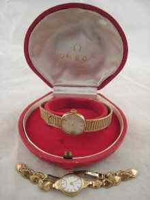 Appraisal: A carat gold Omega lady's wrist watch with integral mesh