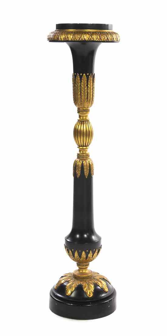 Appraisal: A Neoclassical Ebonized and Parcel Gilt Pedestal the circular top