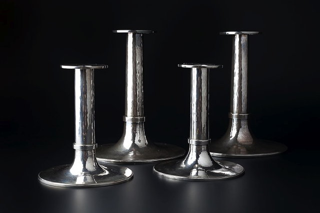 Appraisal: V Holmstrup of DenmarkSet of four silver candlesticksstamped manufacturer's marks