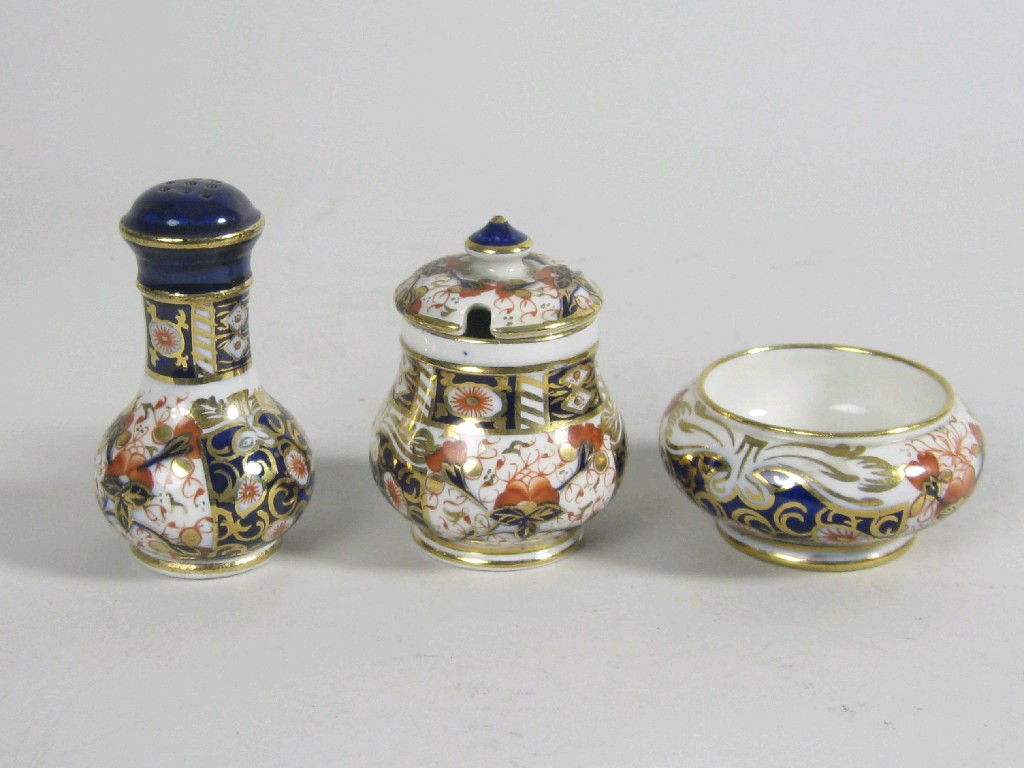 Appraisal: A James MacIntyre Co Burslem three piece Condiment Set decorated