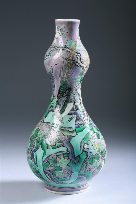 Appraisal: CHINESE SANCAI PORCELAIN DOUBLE GOURD VASE Depicting bird on flowering