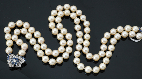 Appraisal: A double strand of cultured pearls Each row comprising forty