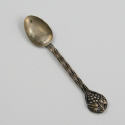 Appraisal: Sterling silver spoon with grape motif and impressed and twisted