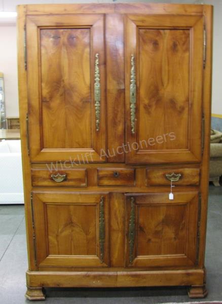 Appraisal: An antique English armoire elm species with heart grain handmade