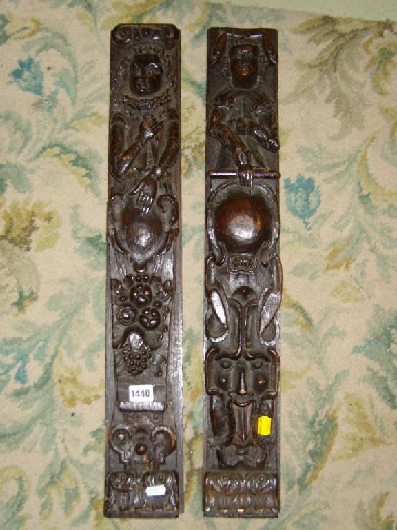 Appraisal: A near pair of period oak panels detailing half length