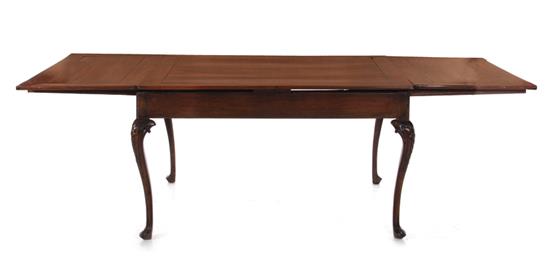 Appraisal: Continental carved cherry dining table th century frame-and-panel top draw