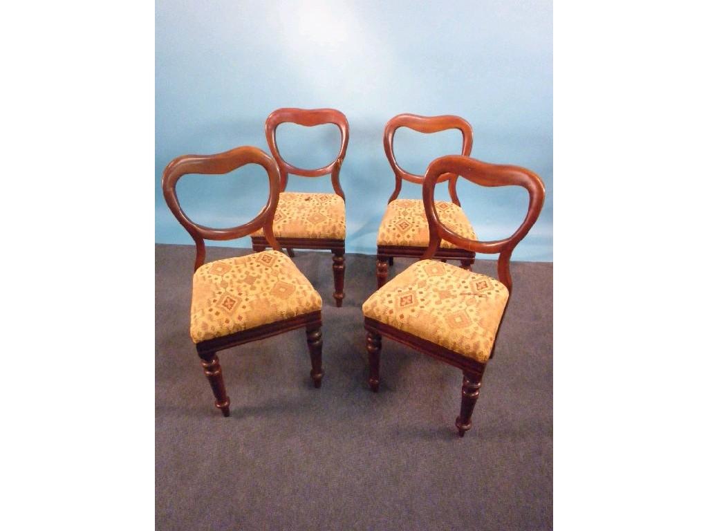 Appraisal: A set of four Victorian mahogany balloon back dining chairs