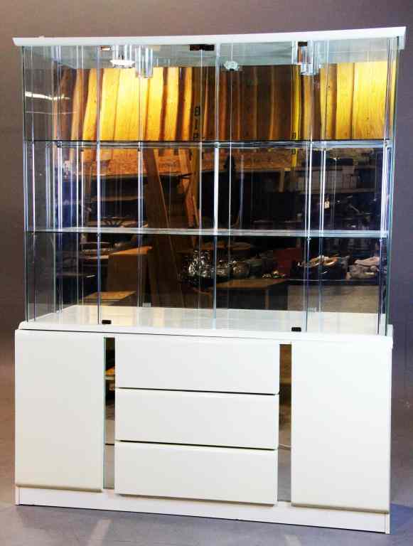 Appraisal: Ivory and Glass Contemporary Display CaseHigh gloss durable epoxy finish