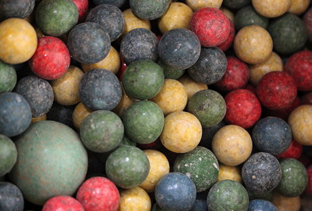 Appraisal: A COLLECTION OF ANTIQUE CLAY MARBLES of various colours