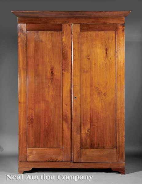 Appraisal: A Massive Louisiana Walnut and Cypress Armoire mid- th c