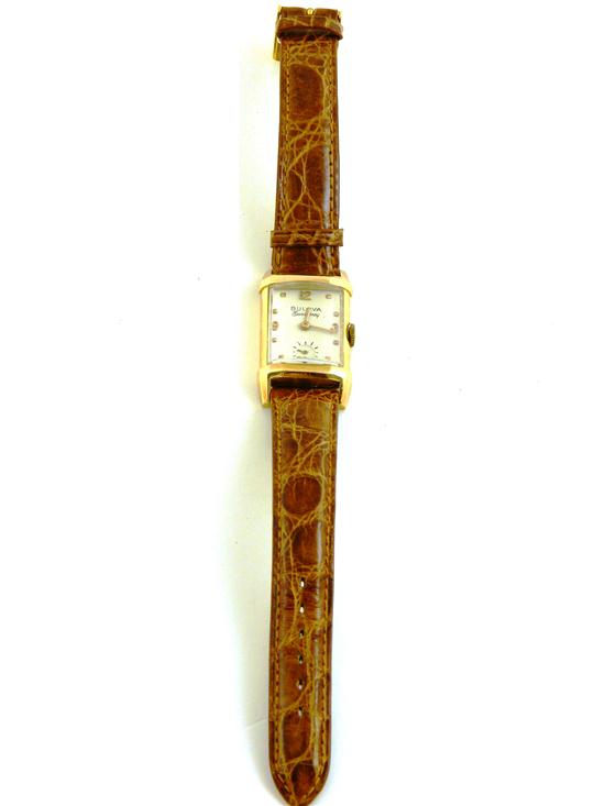 Appraisal: Jewelry Bulova wrist watch K yellow gold tank case brown