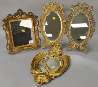 Appraisal: Group of four Victorian brass framed pieces including a pair