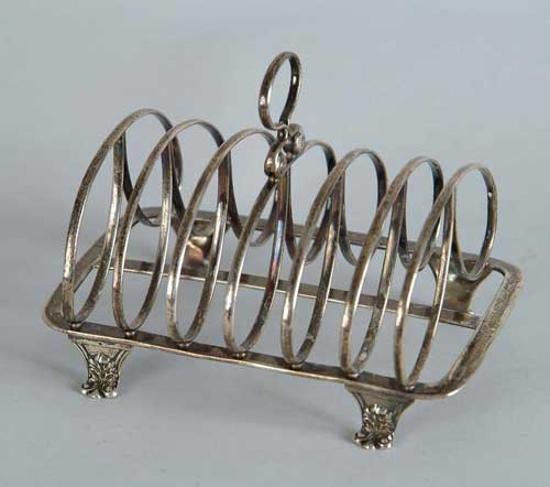 Appraisal: ENGLISH STERLING TOAST RACK Footed rectangular toast rack has six