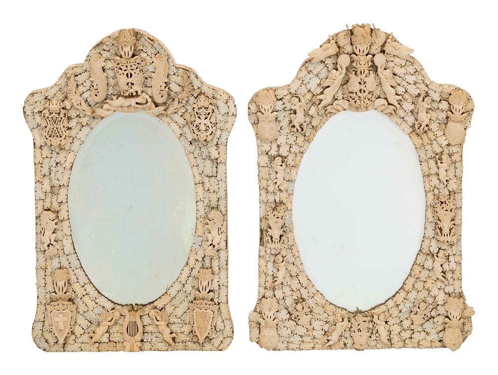 Appraisal: A Pair of Continental Carved Bone Mirrors A Pair of