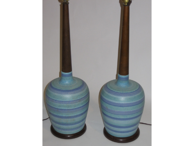 Appraisal: PAIR AMERICAN POTTERY TABLE LAMPS of bottle-from with blue and