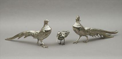 Appraisal: Three Silvered-Metal Pheasant Table Decorations together with a Gucci Woodcock