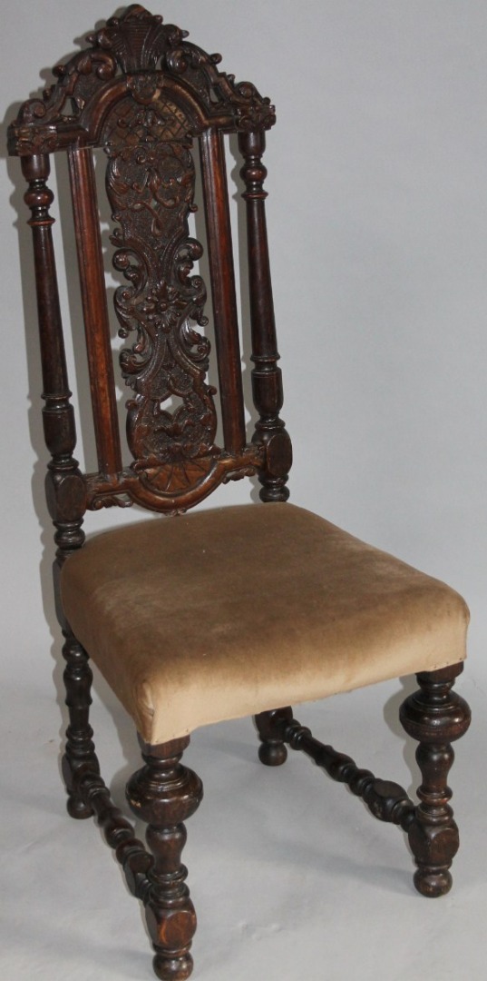 Appraisal: A thC polished walnut Carolean style chair the heavily carved