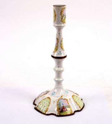 Appraisal: A Bilston enamel candlestick with baluster column enamelled reserves decorated