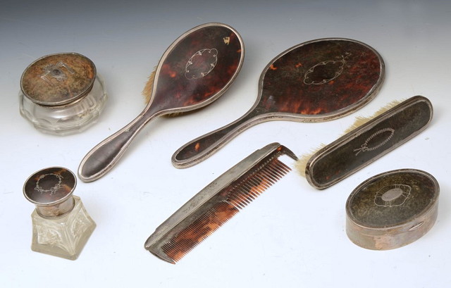 Appraisal: A COLLECTION OF SILVER BACKED DRESSING TABLE WARE with tortoiseshell