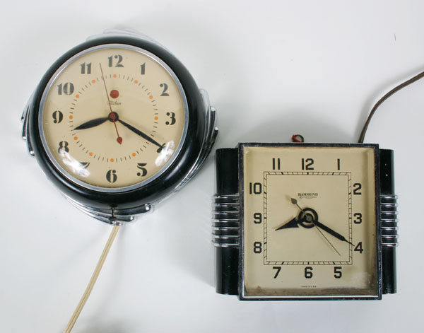 Appraisal: Two art deco chrome and black wall clocks Hammond Synchronous