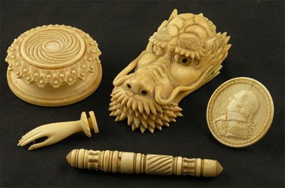 Appraisal: A th century ornamentally turned ivory box and cover in