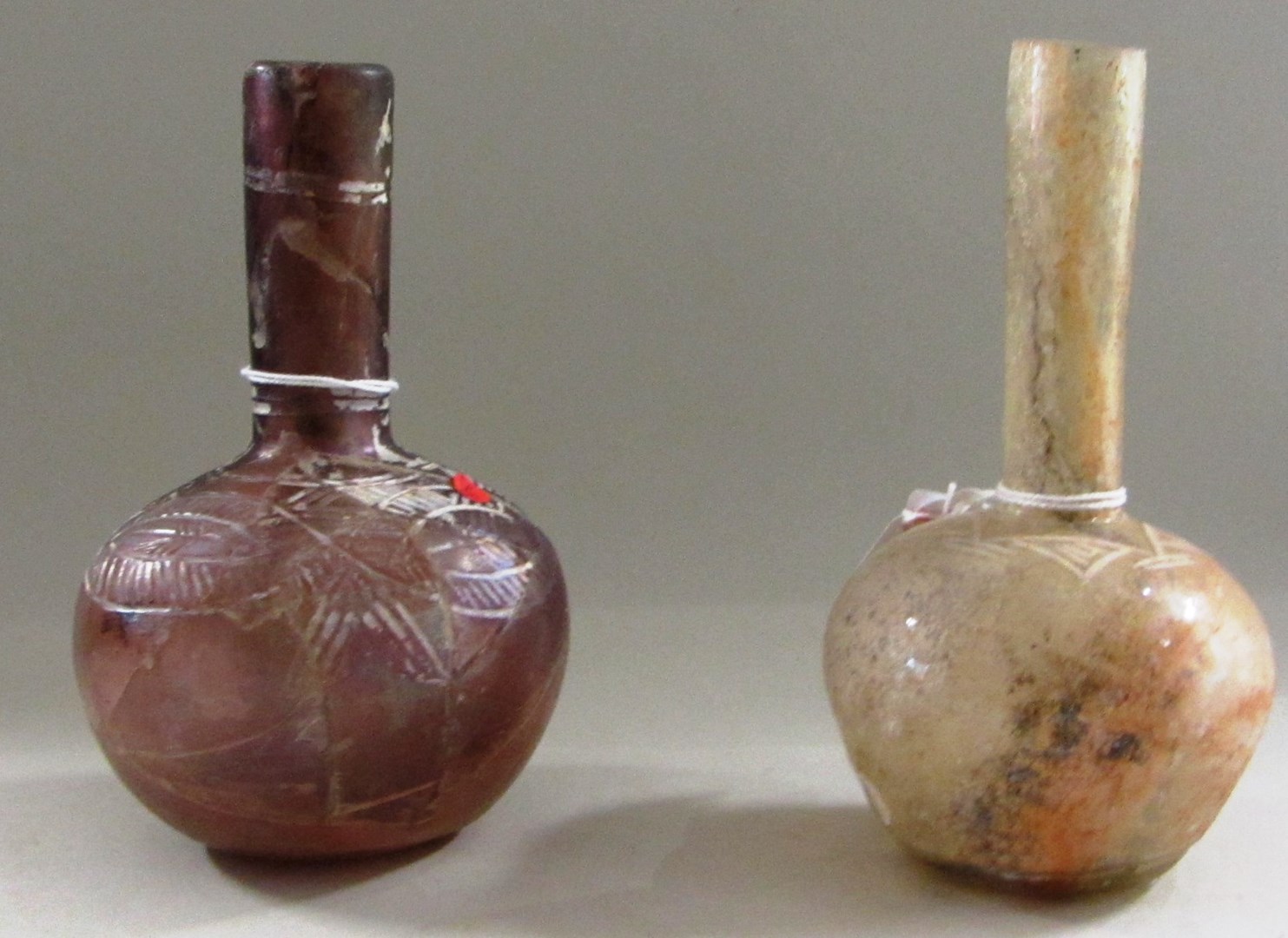 Appraisal: Two wheel cut glass bottles Iran circa th century the